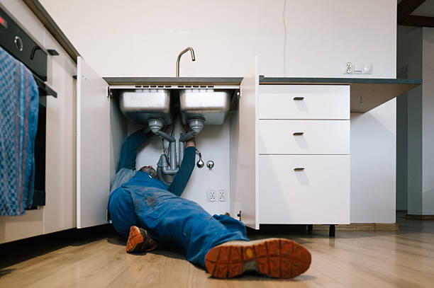 Professional Drain Cleaning technician working in Amherst, MA